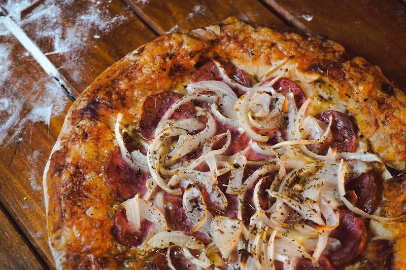 BBQ Brisket via313 pizza with smoked brisket and caramelized onion