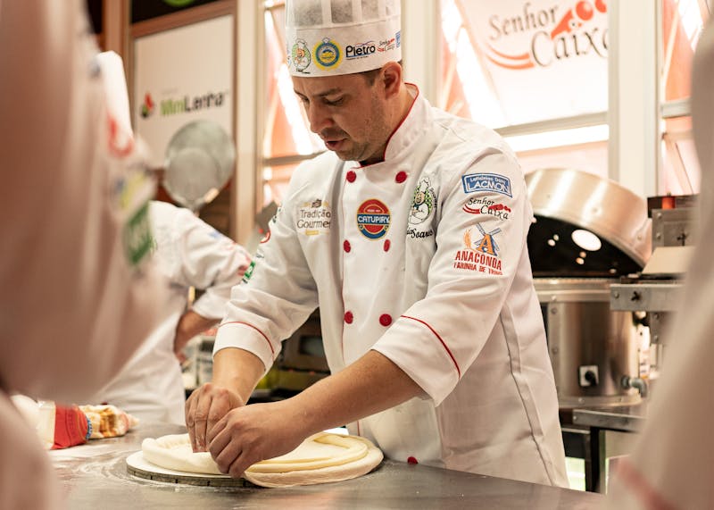 Via 313 Detroit-style pizza being prepared in the kitchen